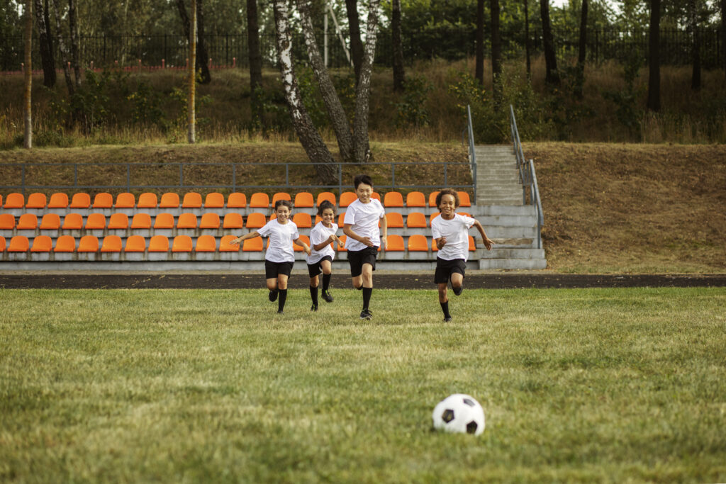 Children engaging in recreational activities within gated community sports infrastructure