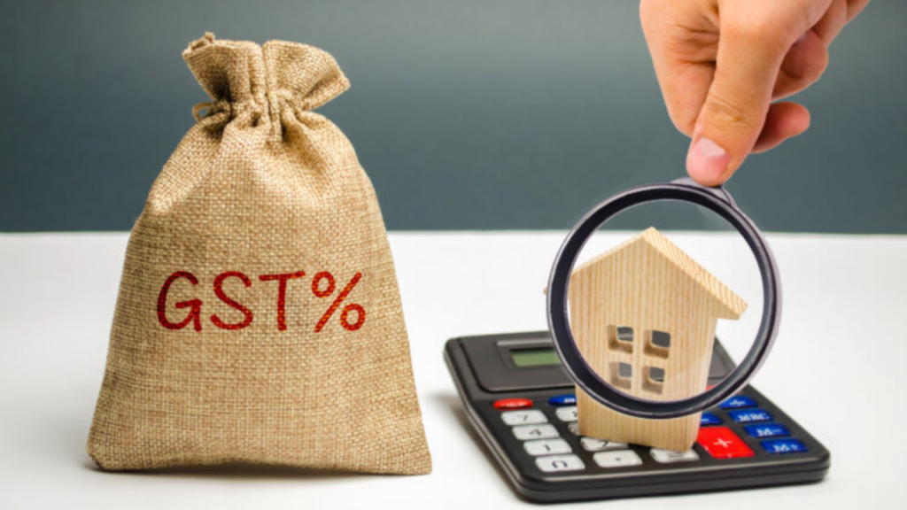 Infographic showing 1% GST for affordable housing vs 5% for luxury flats.